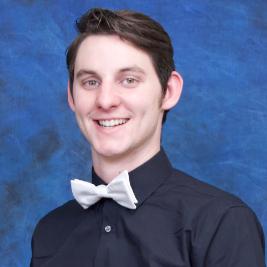 TRAVIS TRIOLA