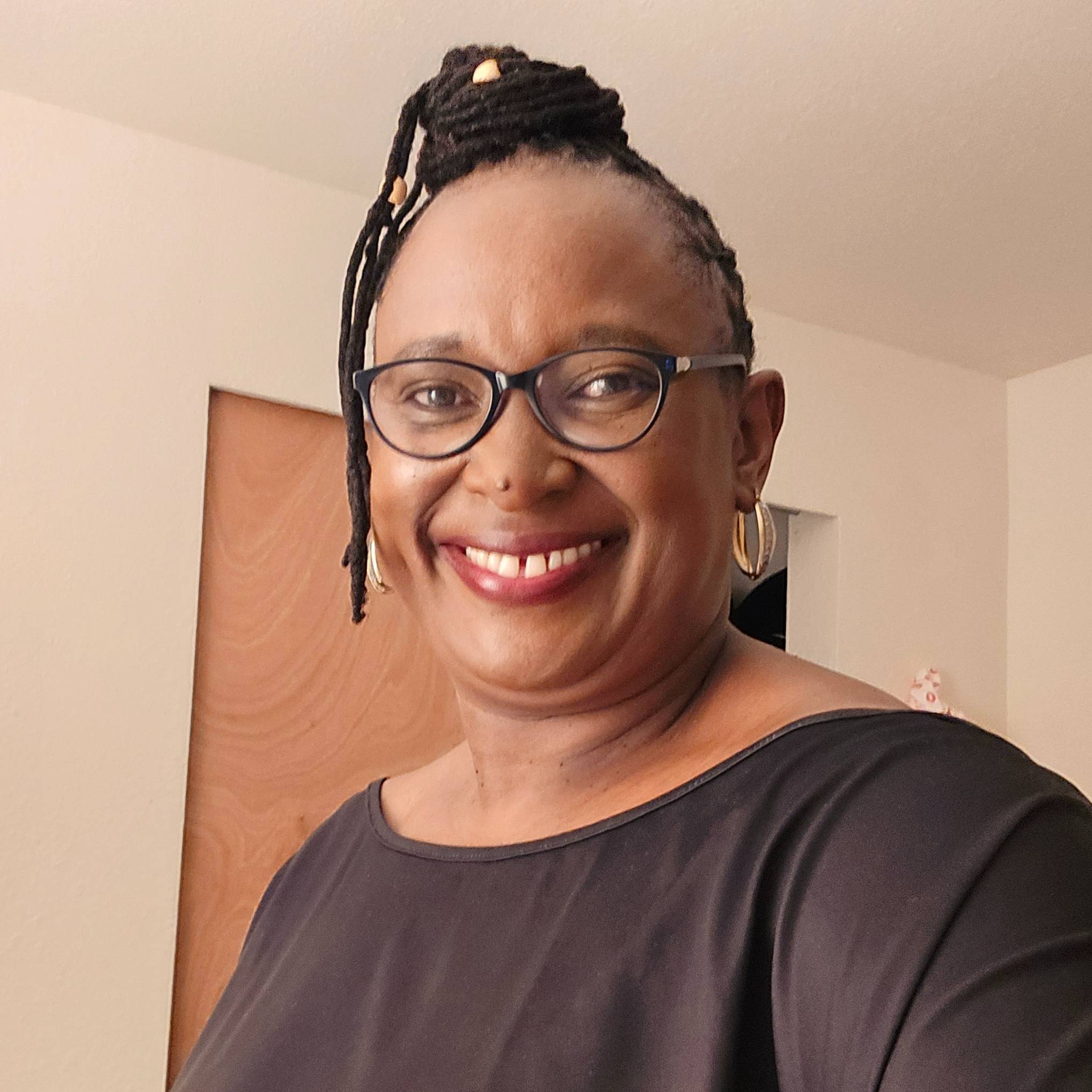 LYNETTE MOMANYI