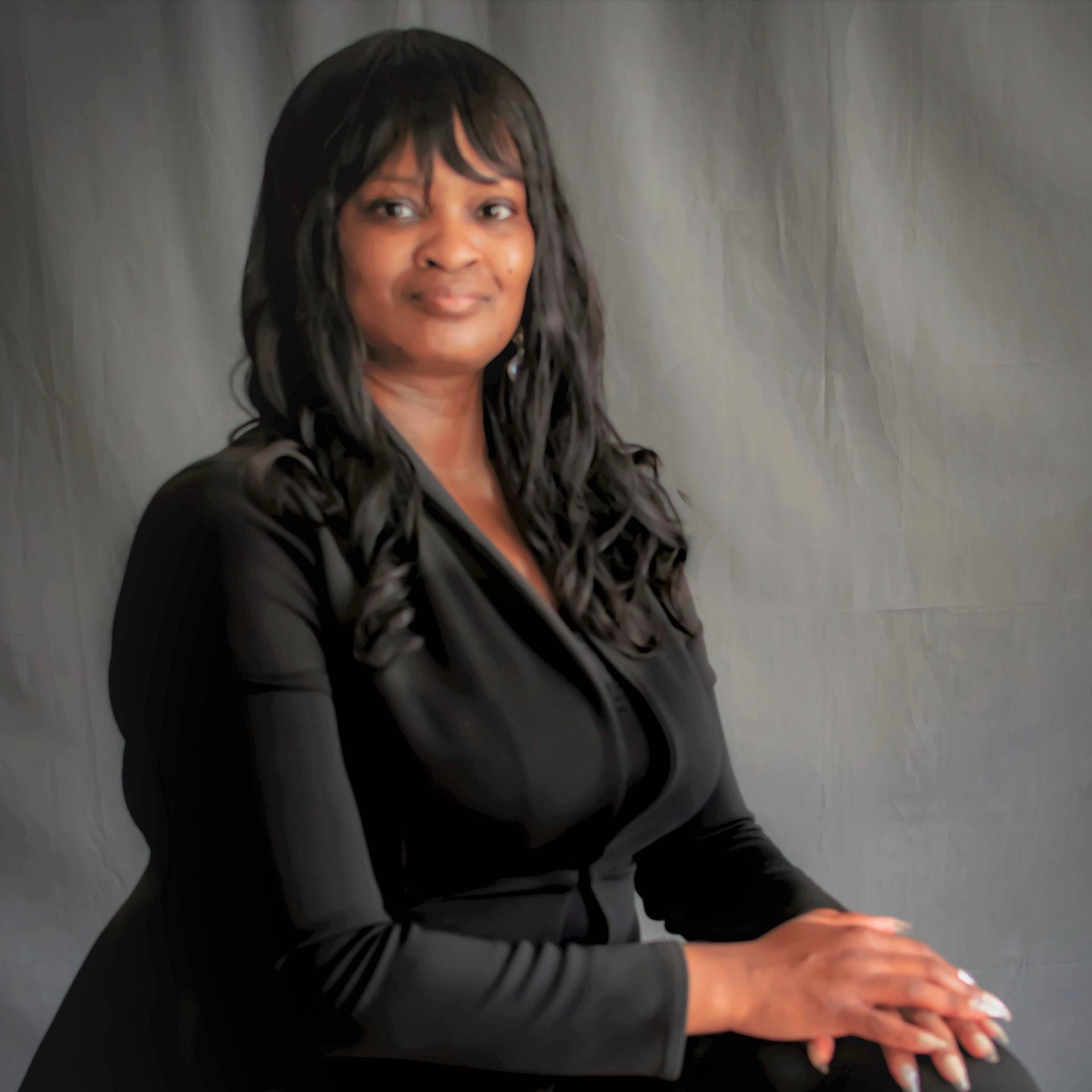 ADRIENNE COFIELD