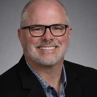 JOHN V. SIKORA