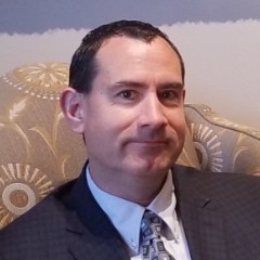GREGORY L. WILKINSON