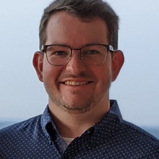 AUSTIN T. ROBINSON