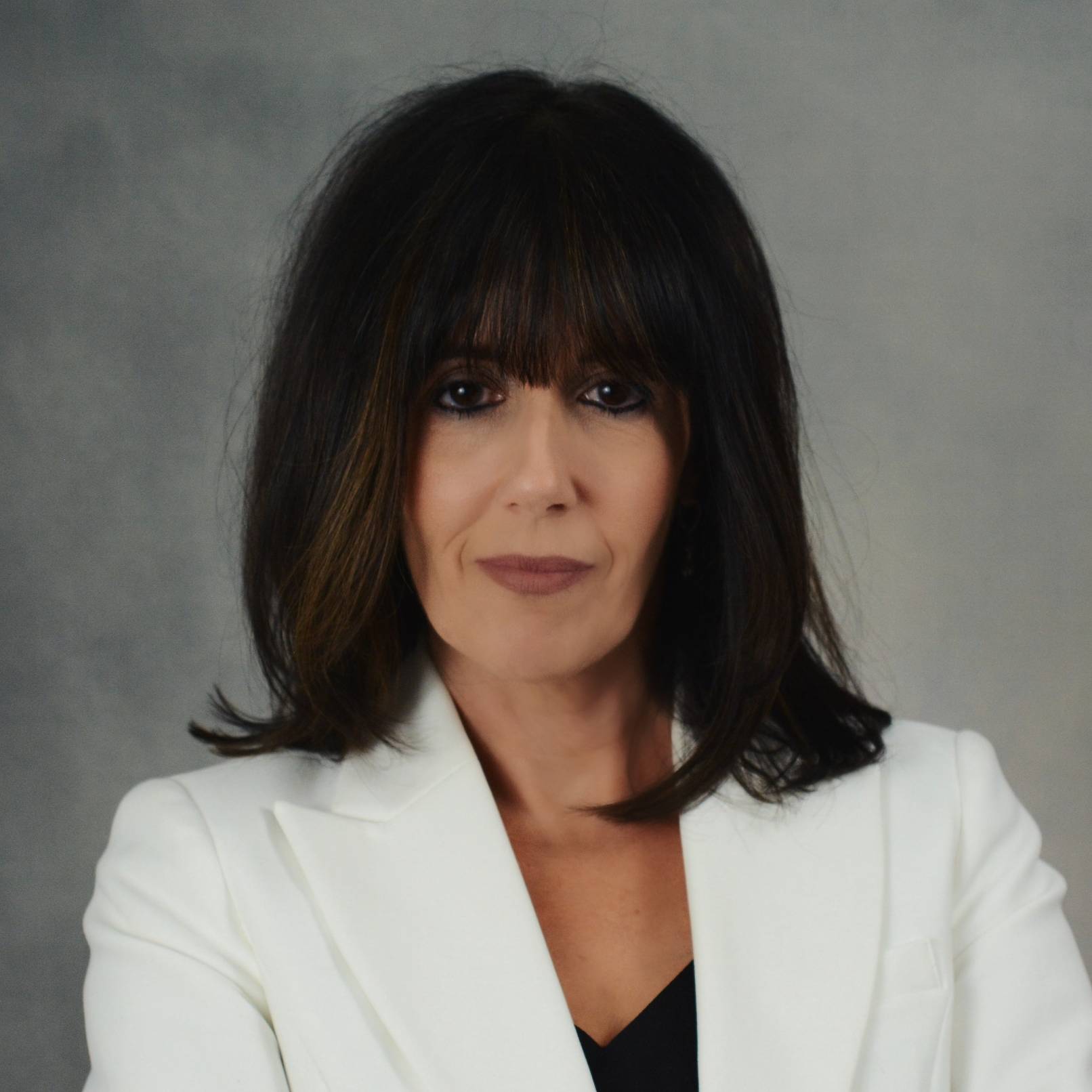 DENISE M. REED