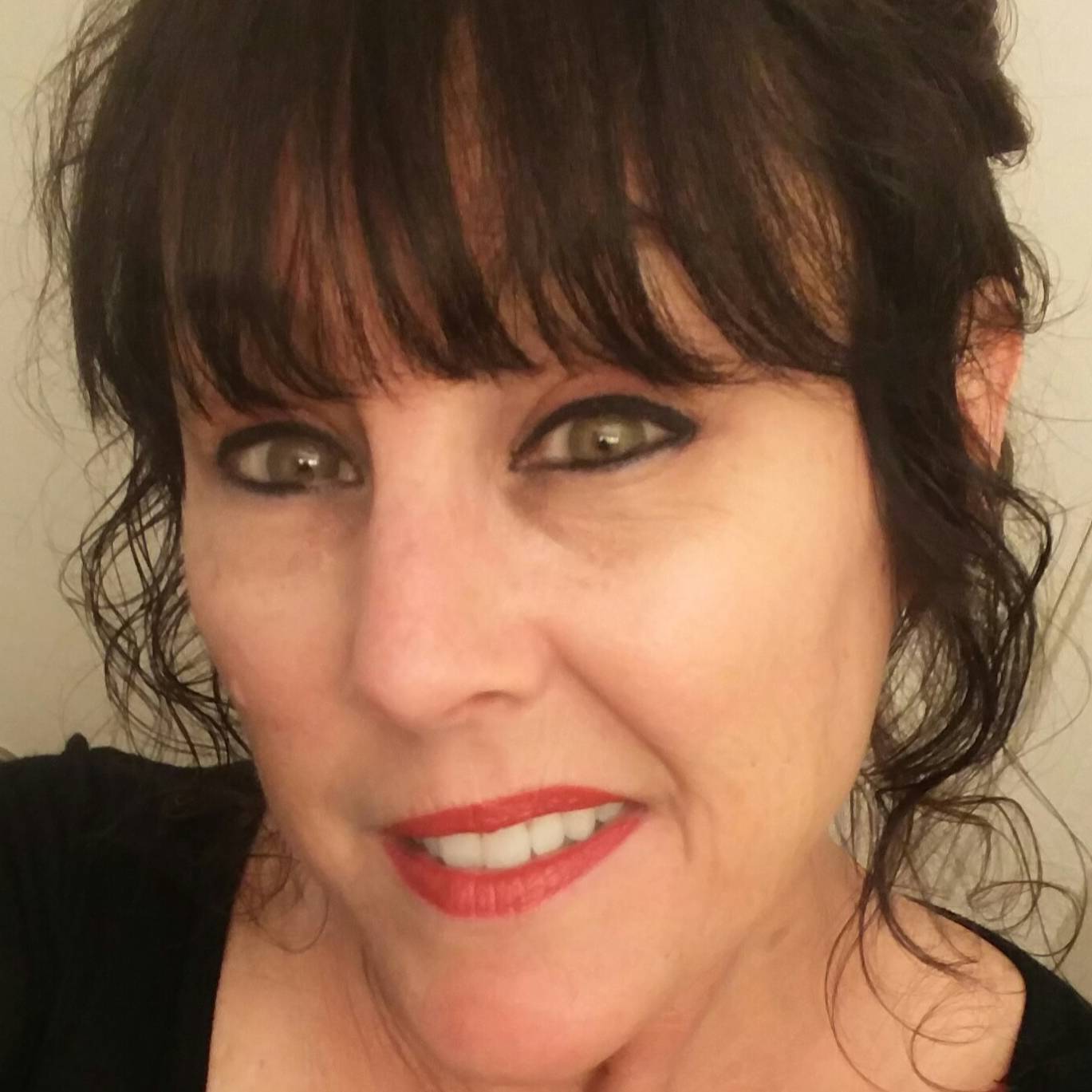 Christine L Harnly