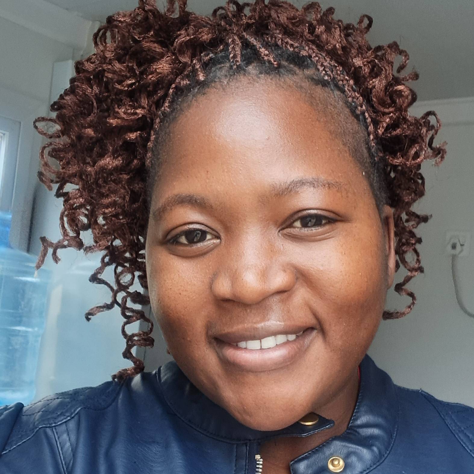 KIMBERLY TAKUNDA TANGI