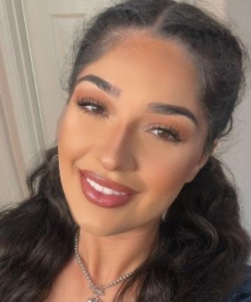 NADINE M. Delgado