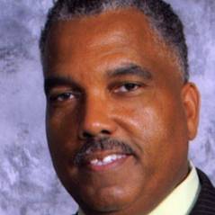 KENNETH E. CARTER