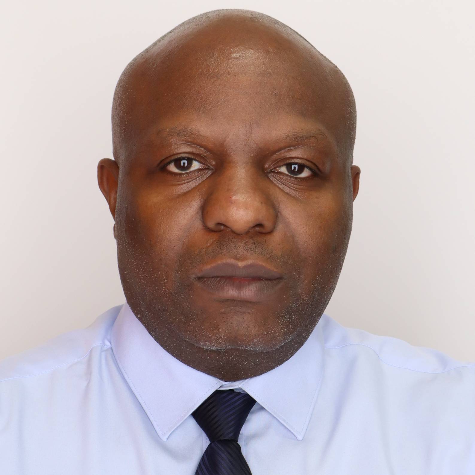 JAMES W. MUKAISI