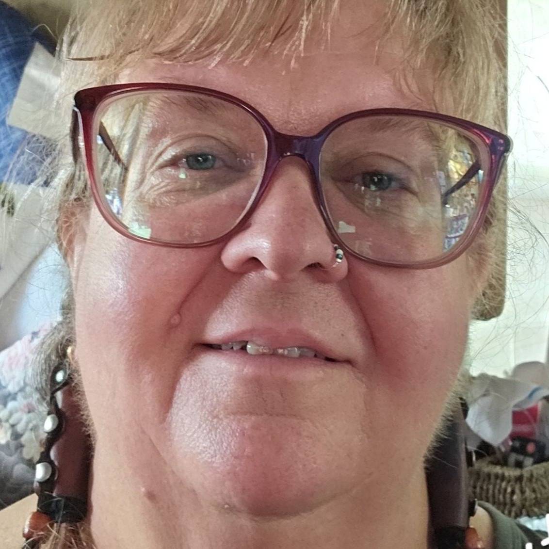 Lora D Strang