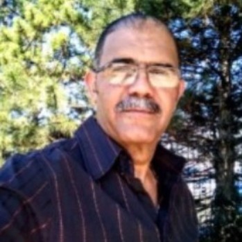 LUIS E. HERNANDEZ