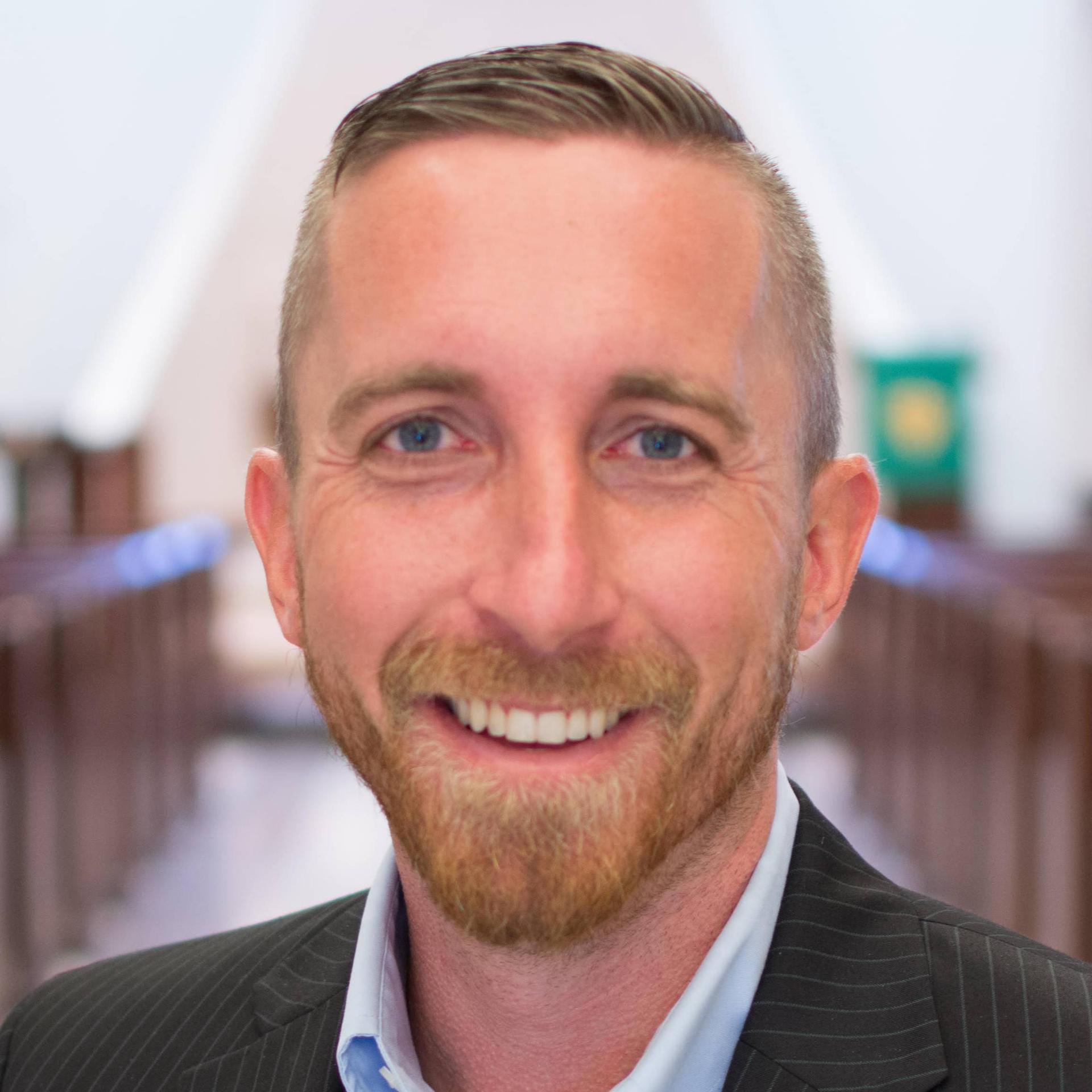 ANDREW J. CLUCK
