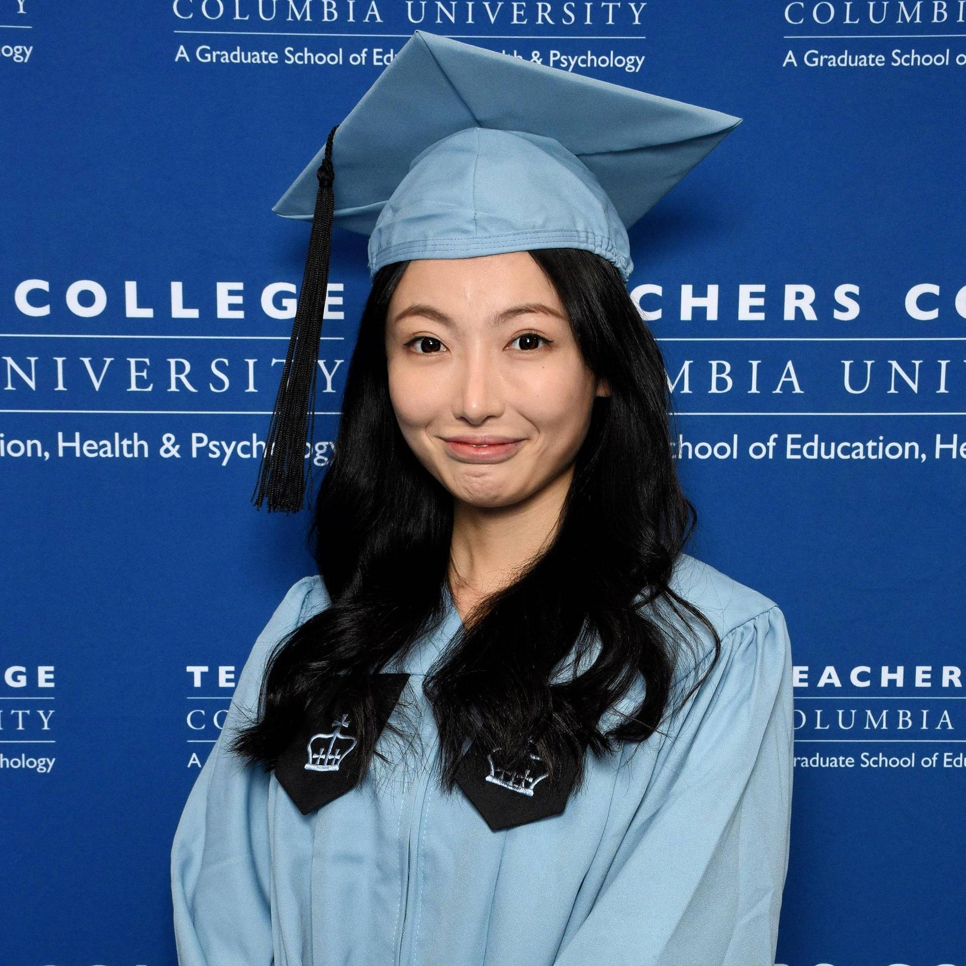 Maggie Wenyi Huang