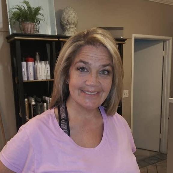 THERESA M. HEALER