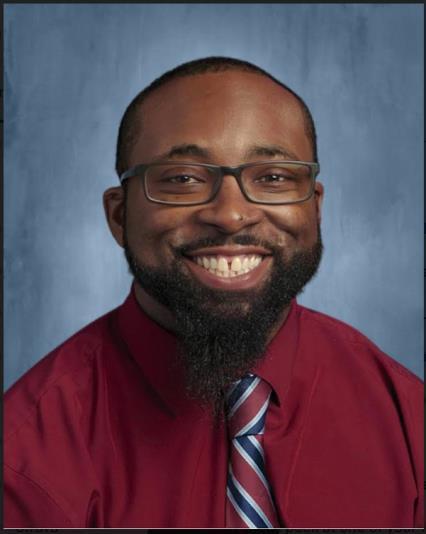 QUINCY M. THOMAS