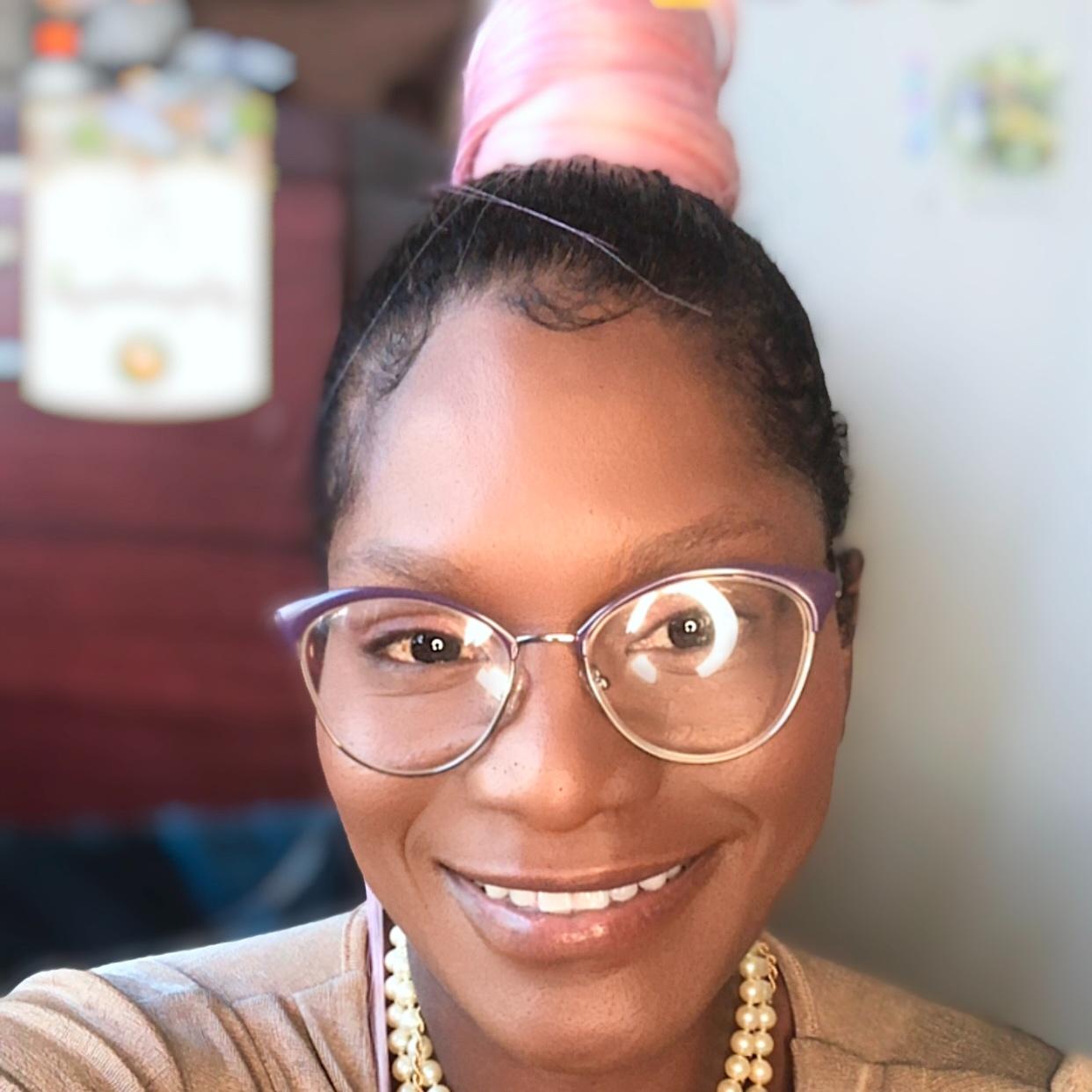 Karrine Clarke-JOHNSON