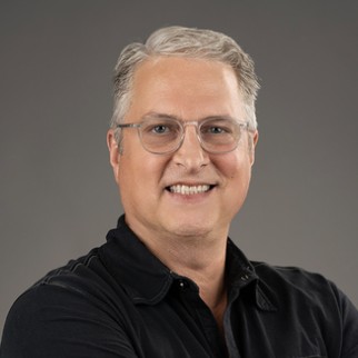 J. Roger Simpson