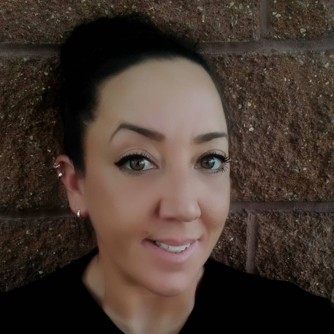 Angela L Snow