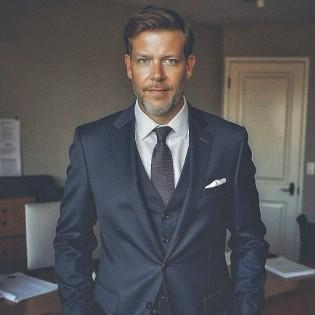 CHAD R. SIMON