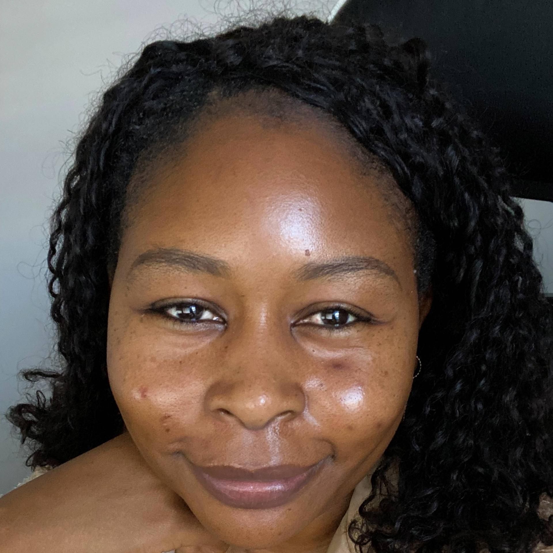 CHRISTINE MOMANYI