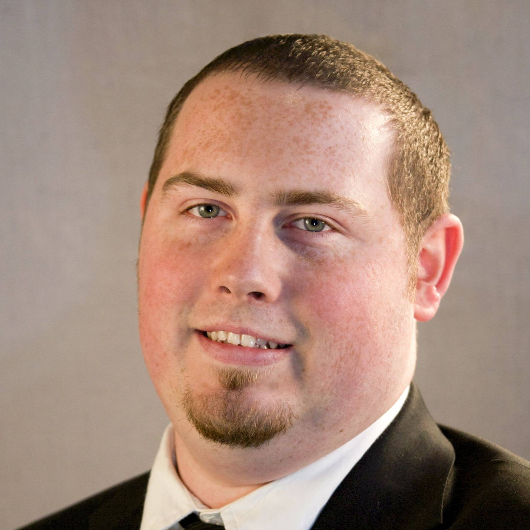 JUSTIN W. ELLENWOOD