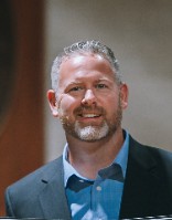 DENNIS J. MITCHELL