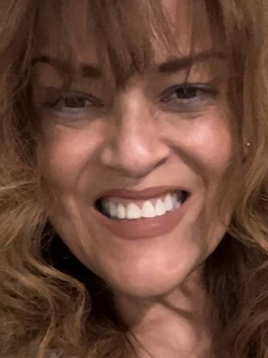 Helga M Martínez