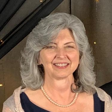 TERESA M. SCROGHAM