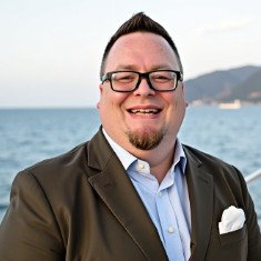 NICHOLAS J. OLINGER